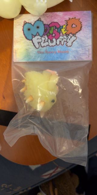 Fluffy yellow collectible